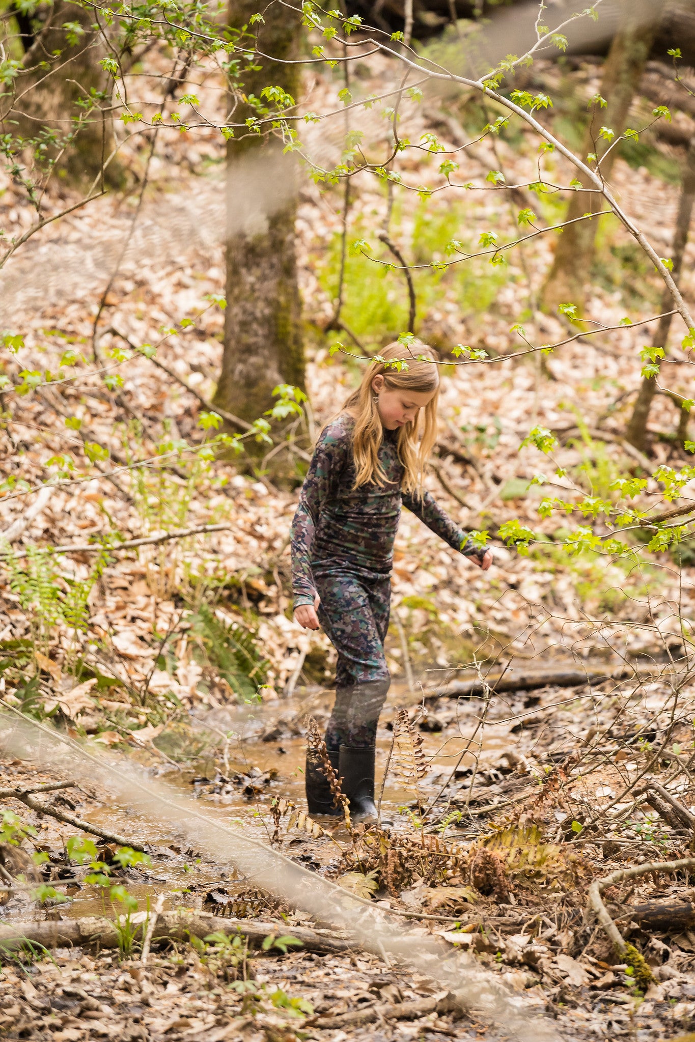 Girl wearing hunting clothes