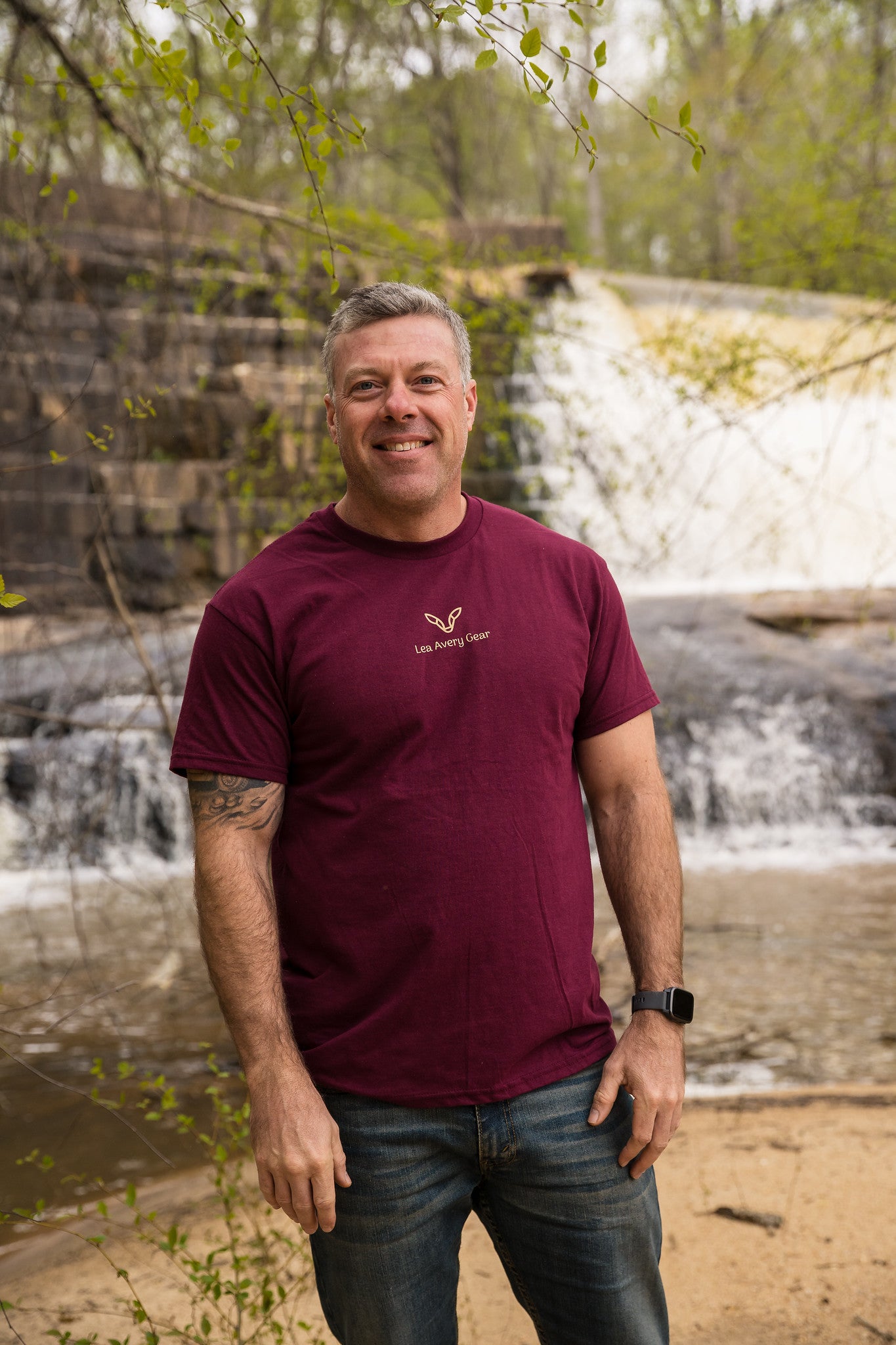 man wearing maroon t-shirt