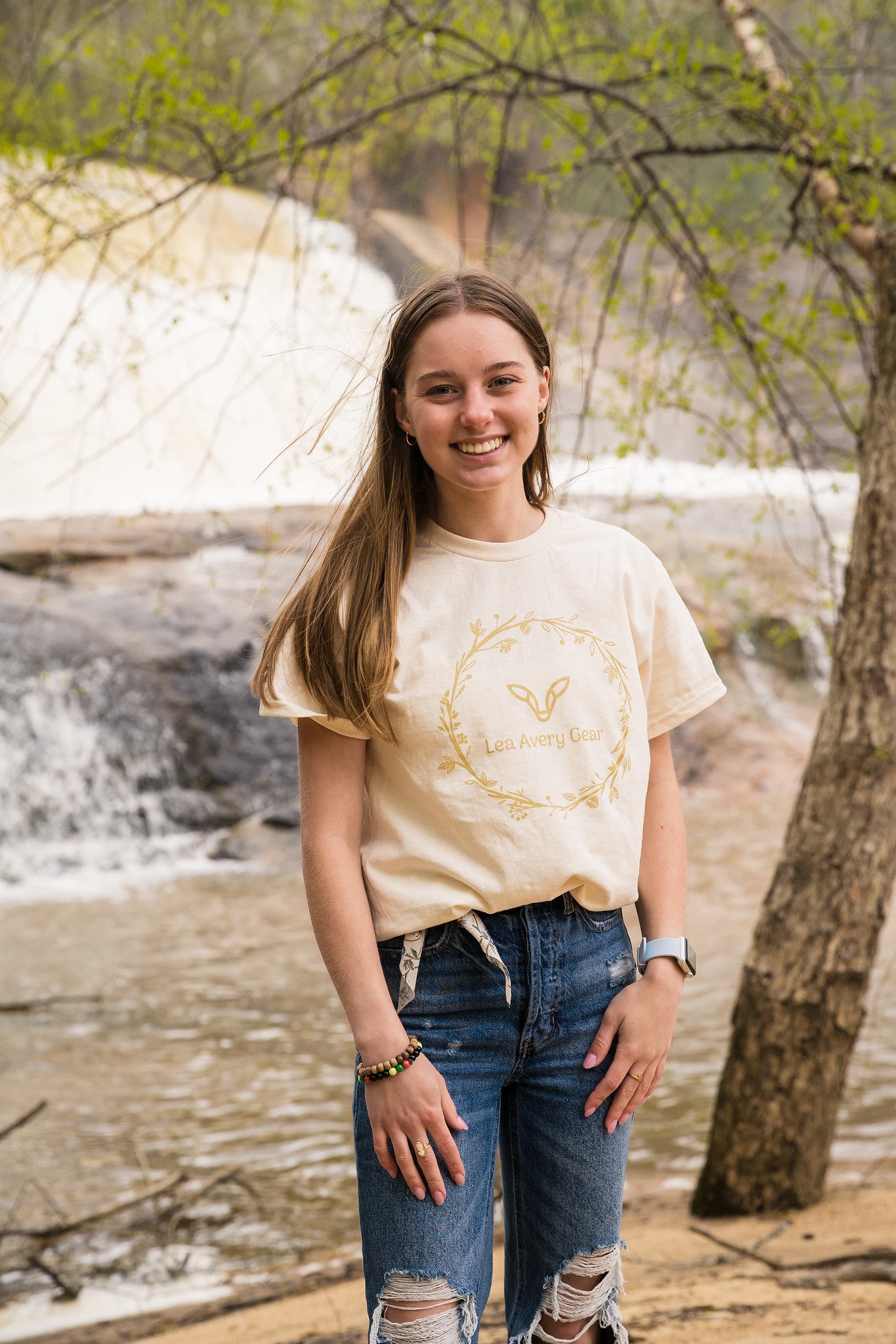 Girl wearing floral logo tshirt