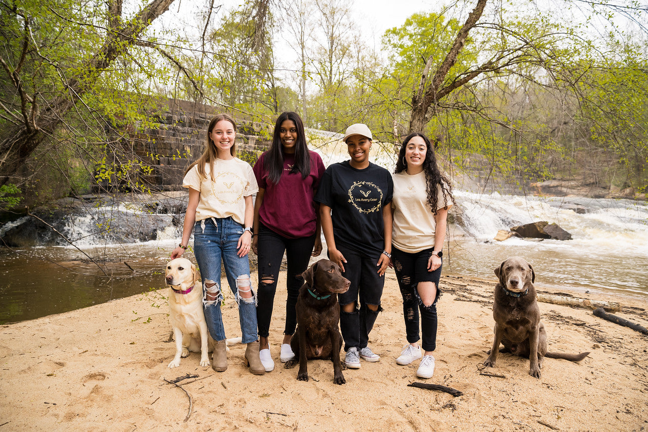 group of girls with dogs wearing t shirts