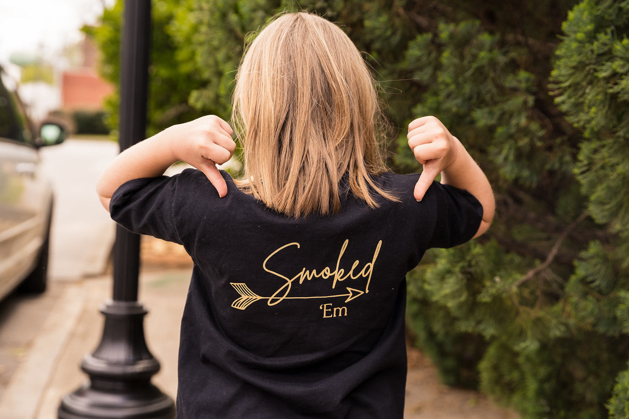 back of t-shirt with "smoked 'em"