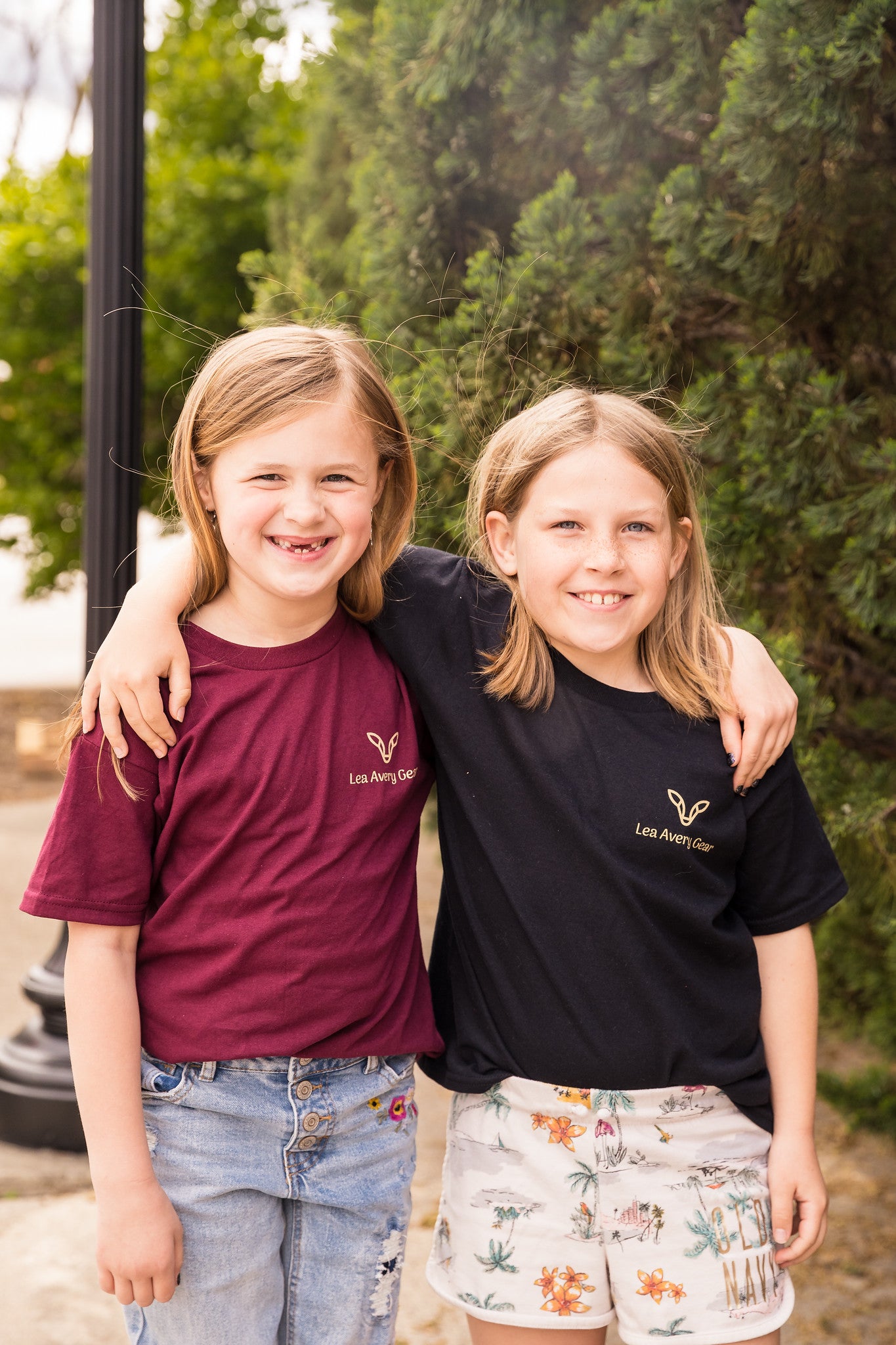 two girls wearing t-shirts