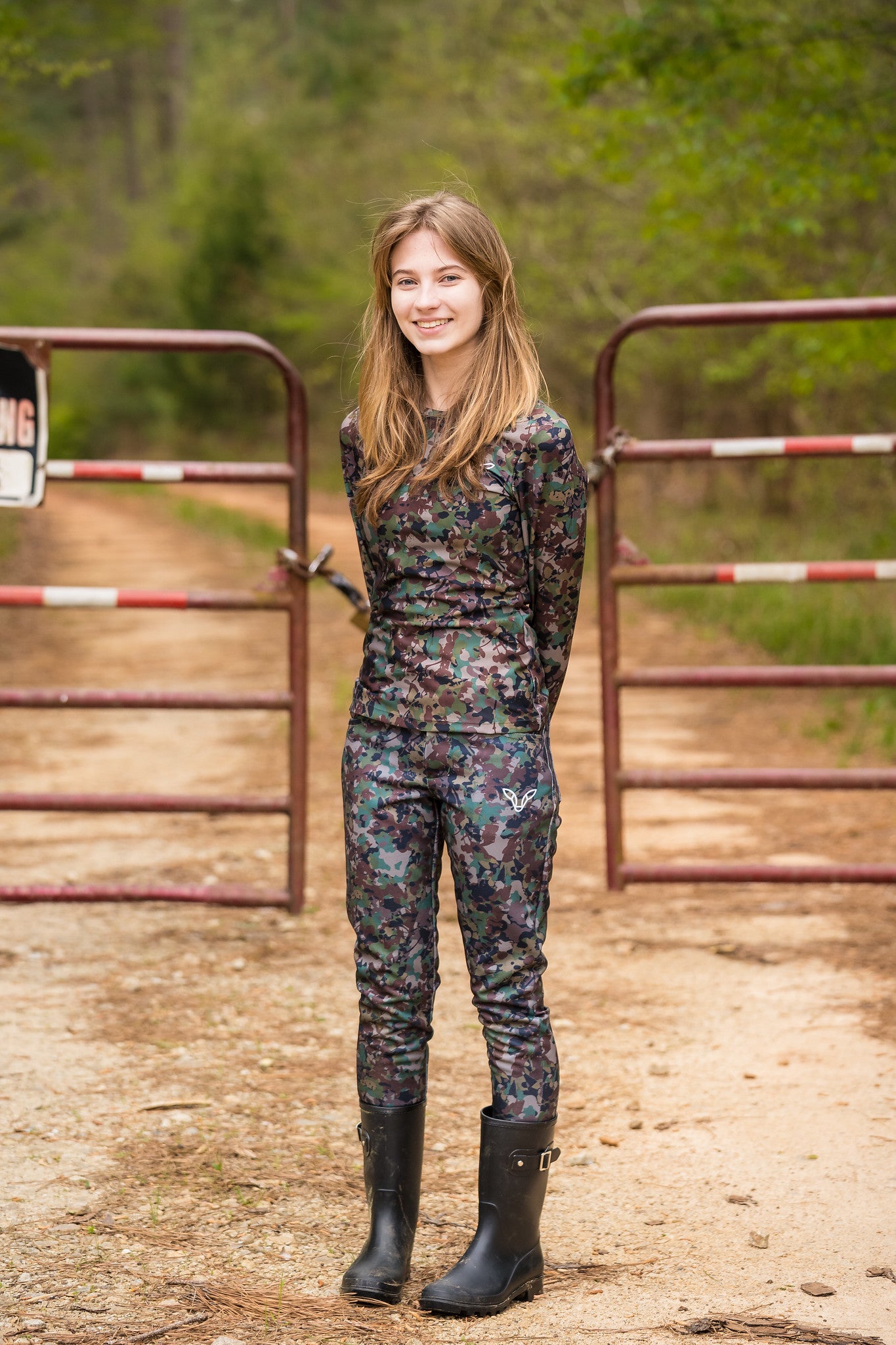 girl wearing camo hunting clothes